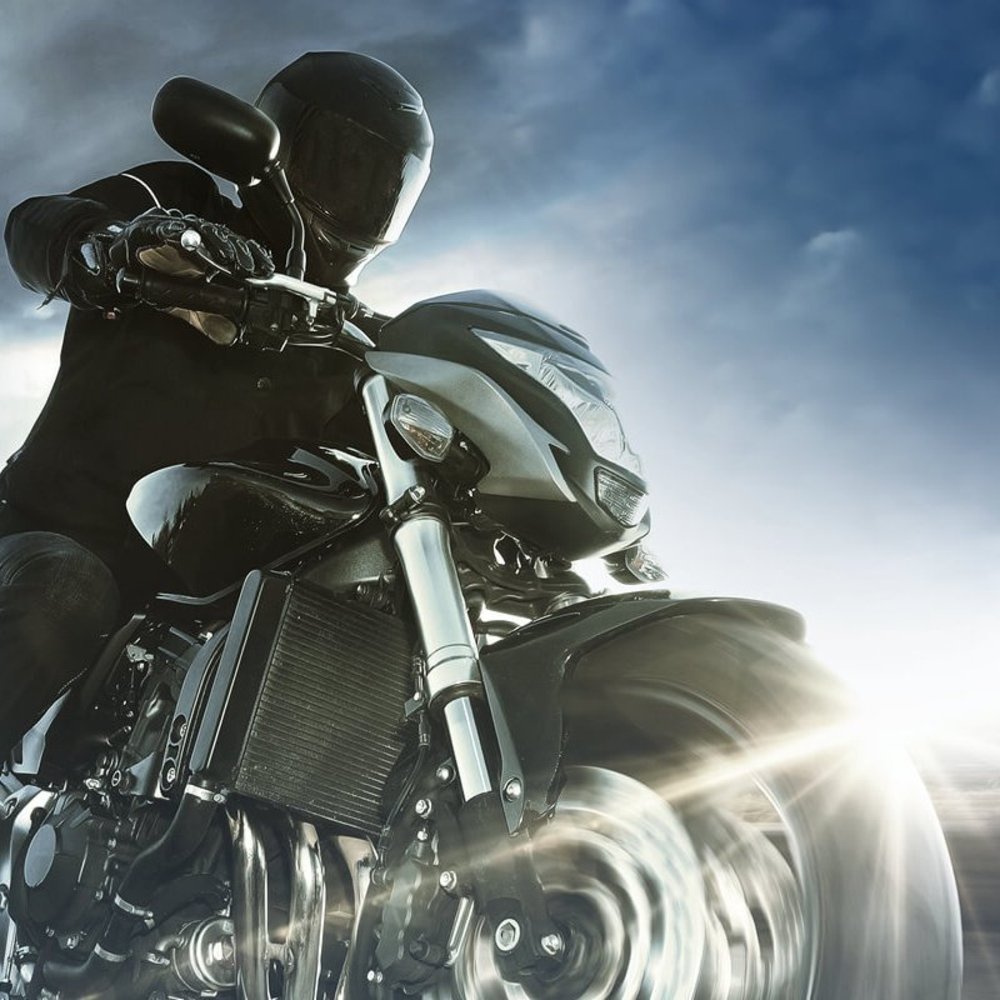 Motorcycle with a motorcyclist.